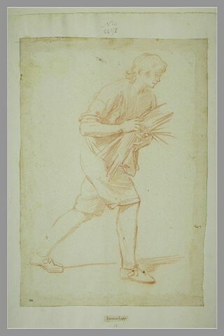 Jeune homme marchant vers la droite, portant un fagot (une brassée de paille?)