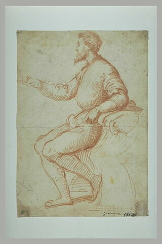 Homme assis, de profil vers la gauche, conversant ; esquisse d'une main gauche, image 1/1