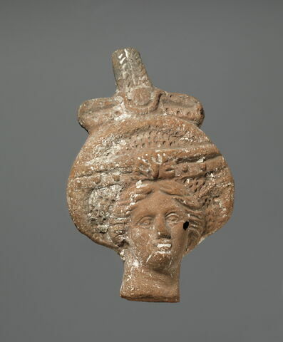 figurine de tête de femme romaine à cou fermé