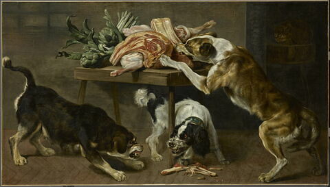 Trois chiens dans un garde-manger