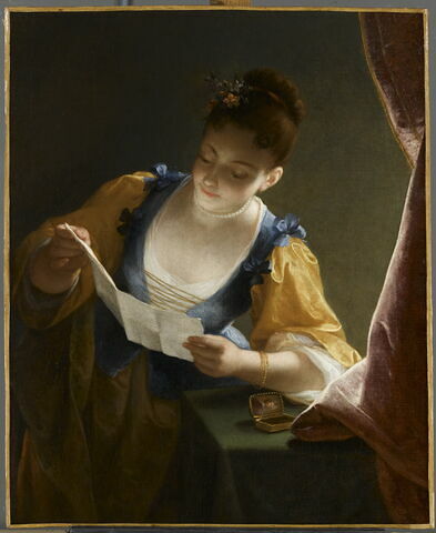 Jeune femme lisant une lettre
