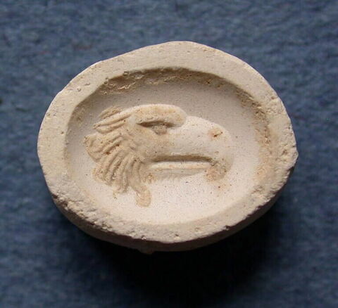 Tirage d'une empreinte d'intaille représentant une tête d'aigle, image 1/1