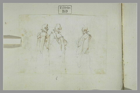 Trois hommes debout, en manteau long, image 1/1