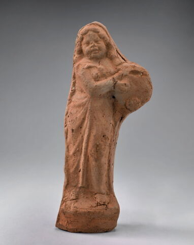 figurine de femme au tambourin