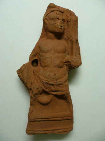 figurine d'Harpocrate portant son image