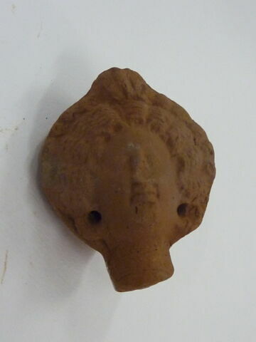figurine de tête de femme romaine à cou fermé