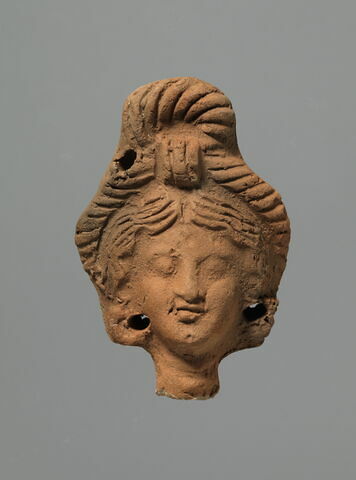 figurine de tête de femme romaine à cou fermé