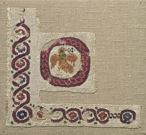 bande décorative d'habillement ; orbiculus ; fragment