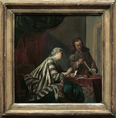 Une femme occupée à cacheter une lettre, image 6/6