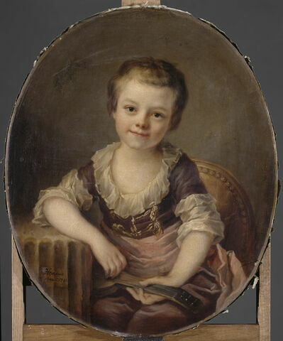 Portrait d'enfant jouant de la guitare, image 3/4