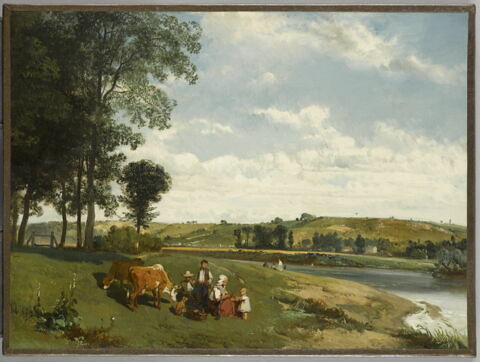 Famille de paysans au bord de l'eau