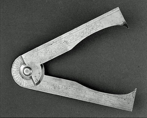 Compas de calibre en forme de jambes, image 2/2