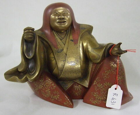 Statuette en bois laqué