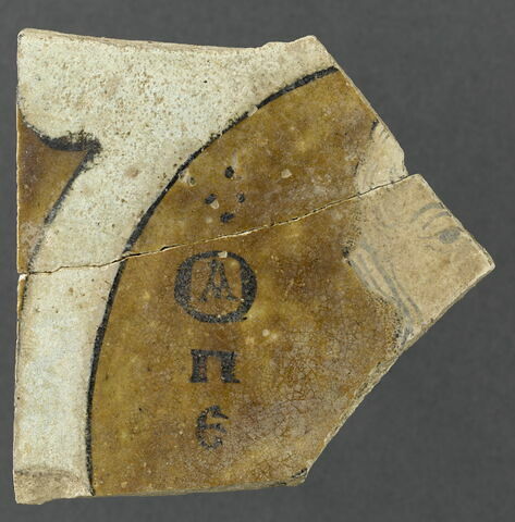 Fragment d'un carreau de céramique murale, image 1/2
