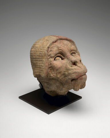 Tête de singe avec un bonnet rouge et blanc, image 4/8