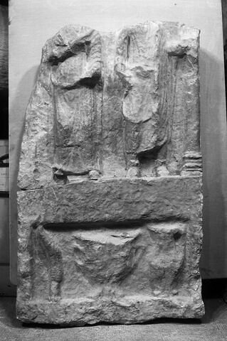 Stèle votive à Saturne (fragment)