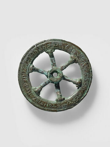 roue ; inscription ; ex-voto