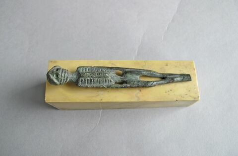 statuette ; manche