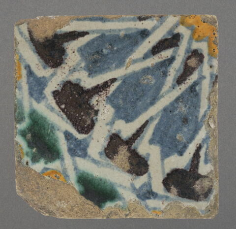 Carreau de revêtement à décor de fragment de polygone étoilé