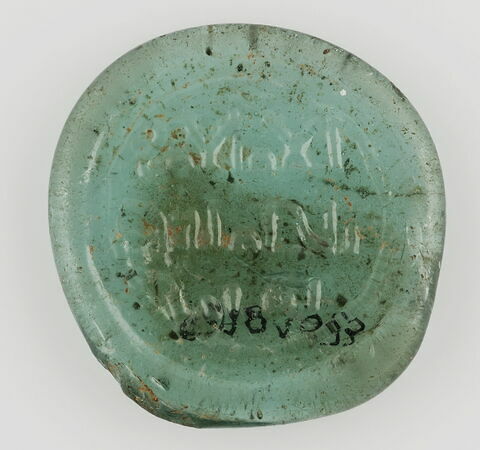 Disque au nom du calife fatimide al-Amir (r. 1101–1130), image 1/2