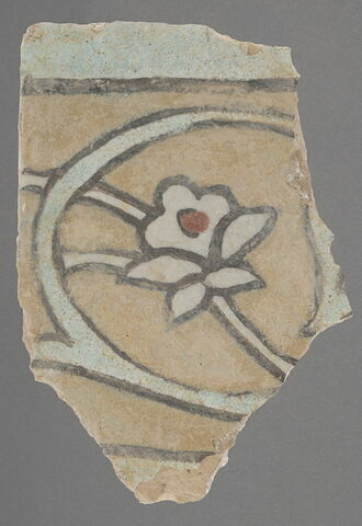 Fragment de carreau orné
