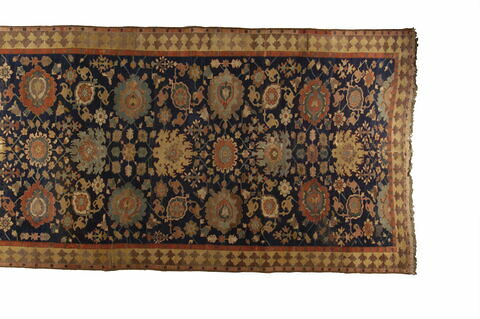 Tapis à palmettes auréolées dit 