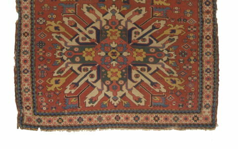 Tapis à médaillons déchiquetés dit 
