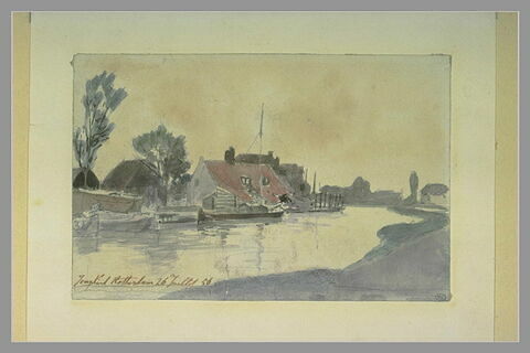Vue d'un canal en Hollande avec une barque amarrée devant une maison, image 1/1