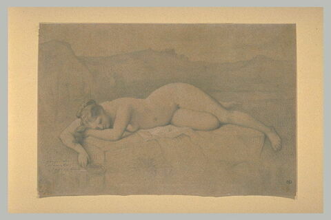 Femme nue couchée sur un rocher