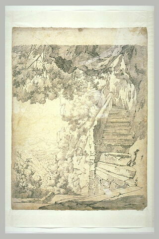 Escalier montant parmi des rochers