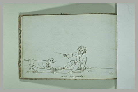Enfant assis près d'un chien via di testa spaccata, image 1/1