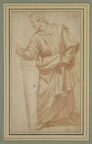 Figure d'homme debout drapé et appuyé sur un bâton