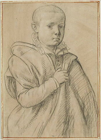 Portrait de jeune garçon tenant sa main droite sur la poitrine
