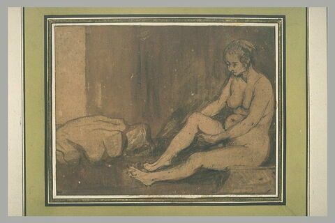 Femme nue, assise à terre