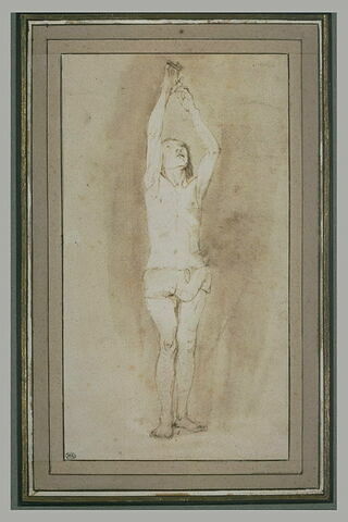 Jeune garçon en pagne, les deux mains accrochées à une petite barre, image 1/1