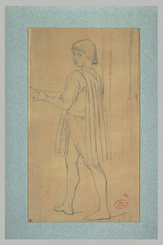 Jeune garçon en costume médiéval portant un plat, image 1/1