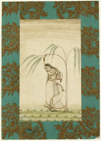 Femme indienne debout sous un saule pleureur