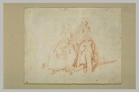 Deux femmes assises, se tenant par la main, image 1/1