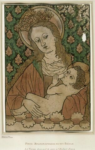 Vierge à mi-corps allaitant l'Enfant Jésus