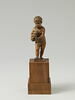 Statuette : Enfant jouant de la musette, image 1/5