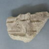 Fragment de pilastre décoré d'un putto et d'un écu, image 1/7