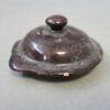 couvercle à bouton, image 1/2