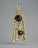 boucle d'oreille, image 1/2